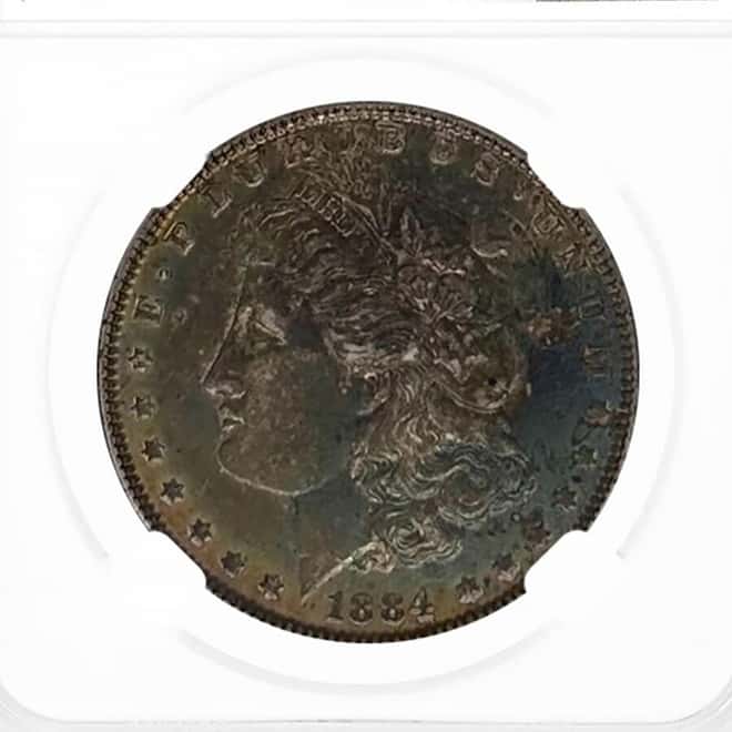 1884 Morgan Silver Dollar $1 NGC AU 55 (Toned)