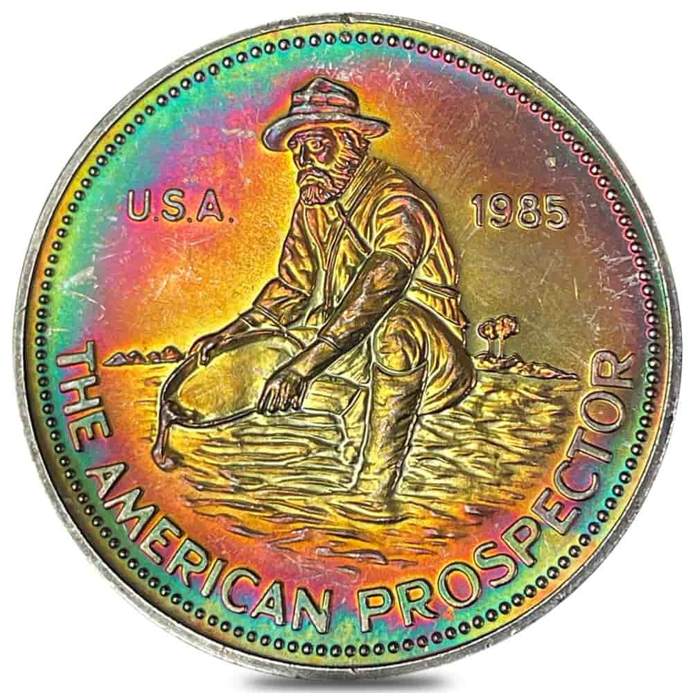 1985 1 oz Engelhard Prospector Silver Round .999 Fine (Rainbow Toning, 25855)